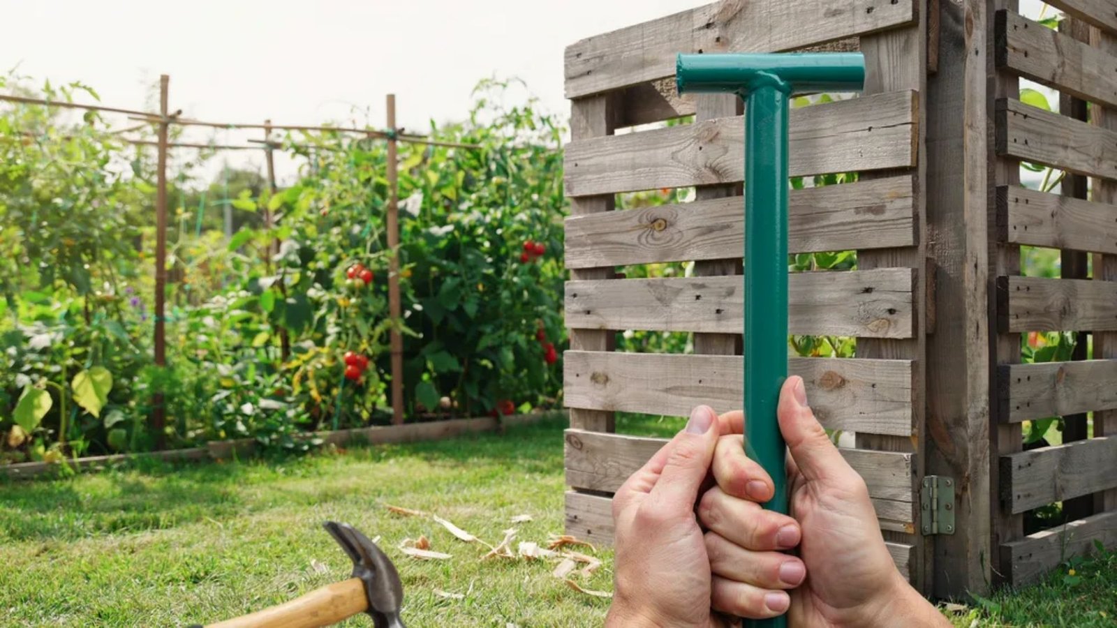 stabilizing a pallet gate with a T-post without digging holes.