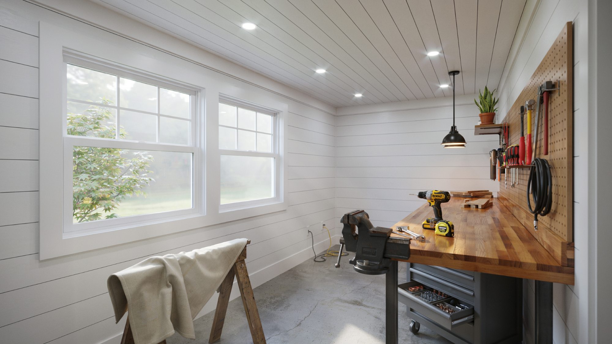 Bright inside shed with LED lights, windows, and electrical outlets