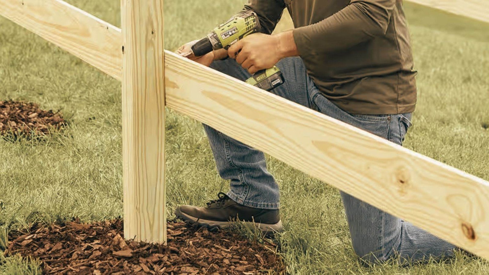 Installing wooden fence rail on post for step down fence on sloped yard