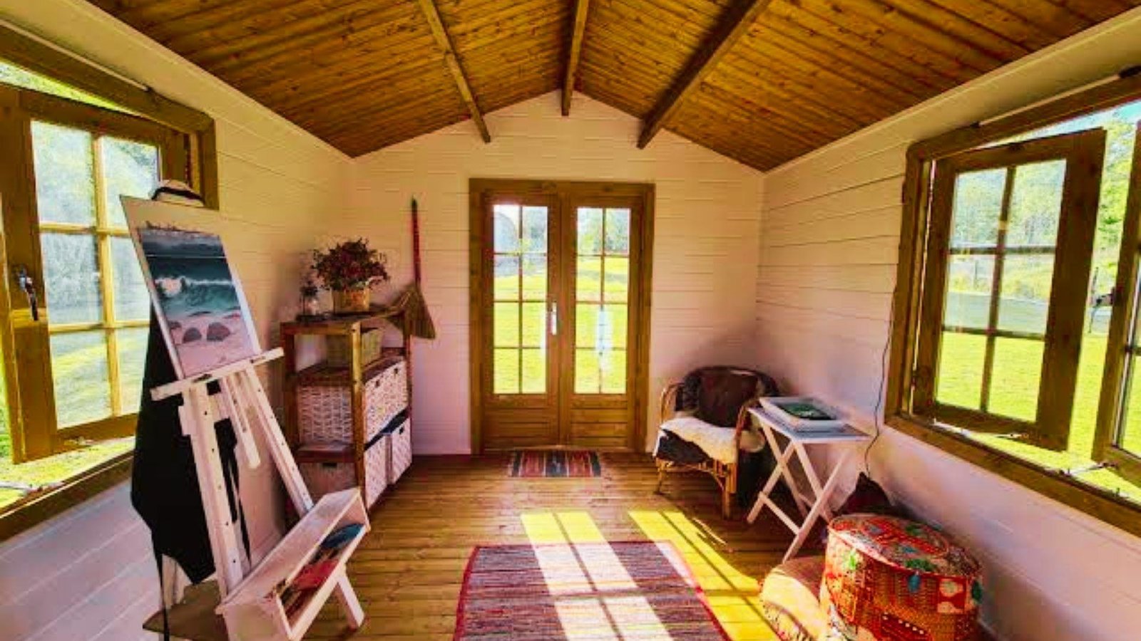 Rustic cabin style she shed interior.