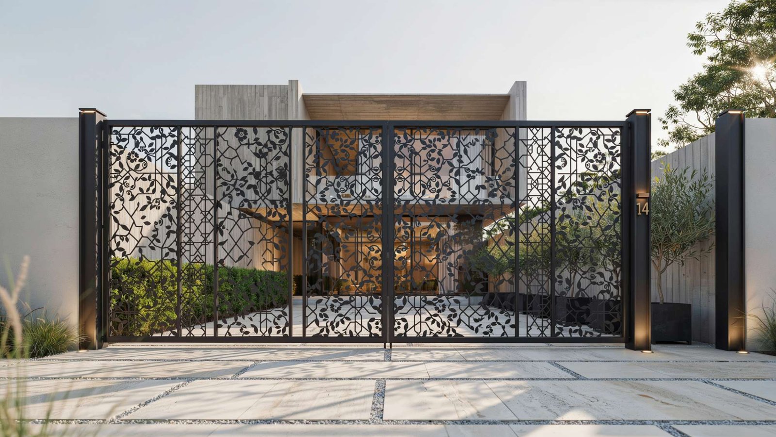 Decorative laser-cut metal courtyard gate with artistic patterns.