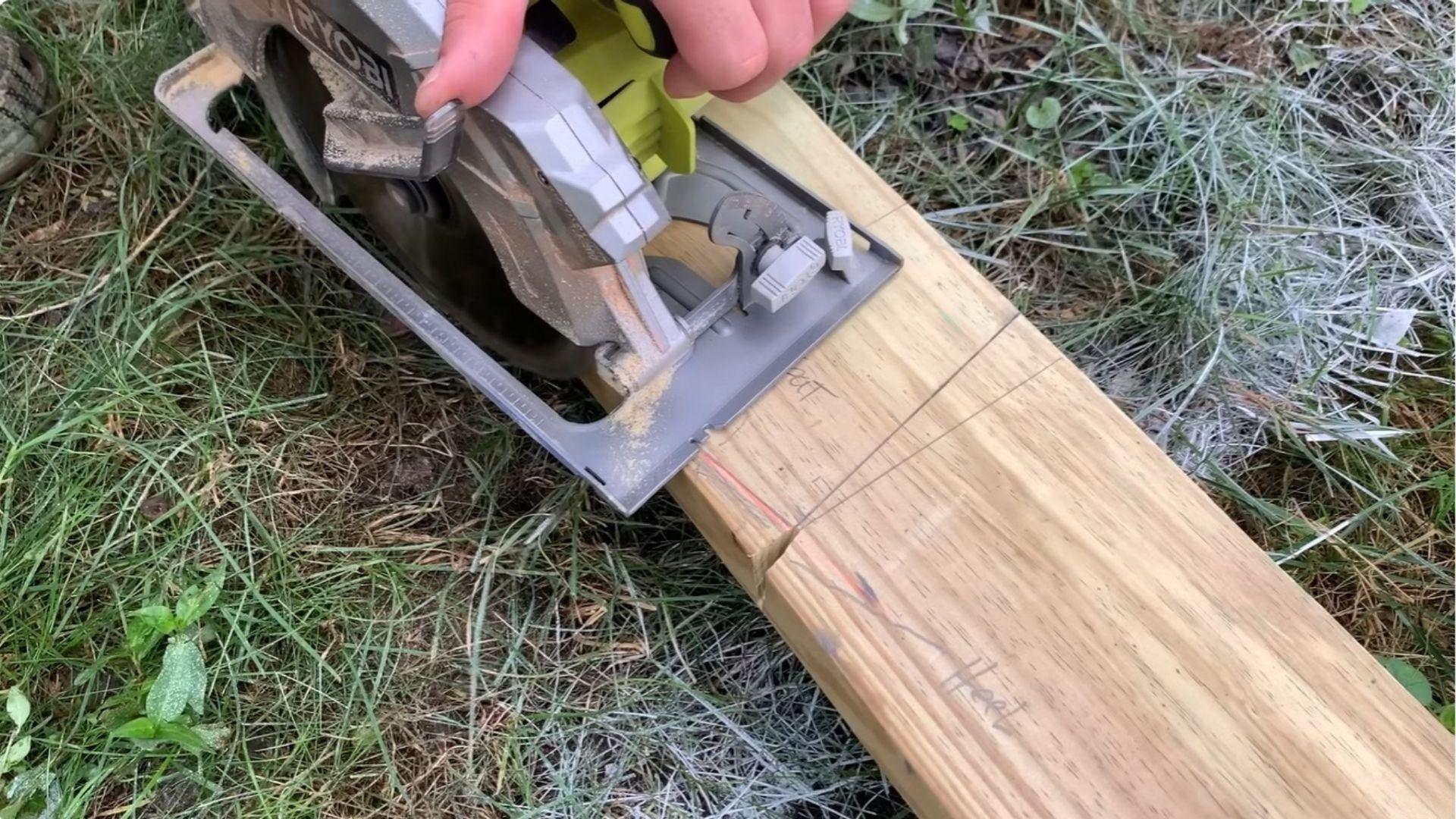 Shed roof rafter with cut birdsmouth notches used as a template for other rafters